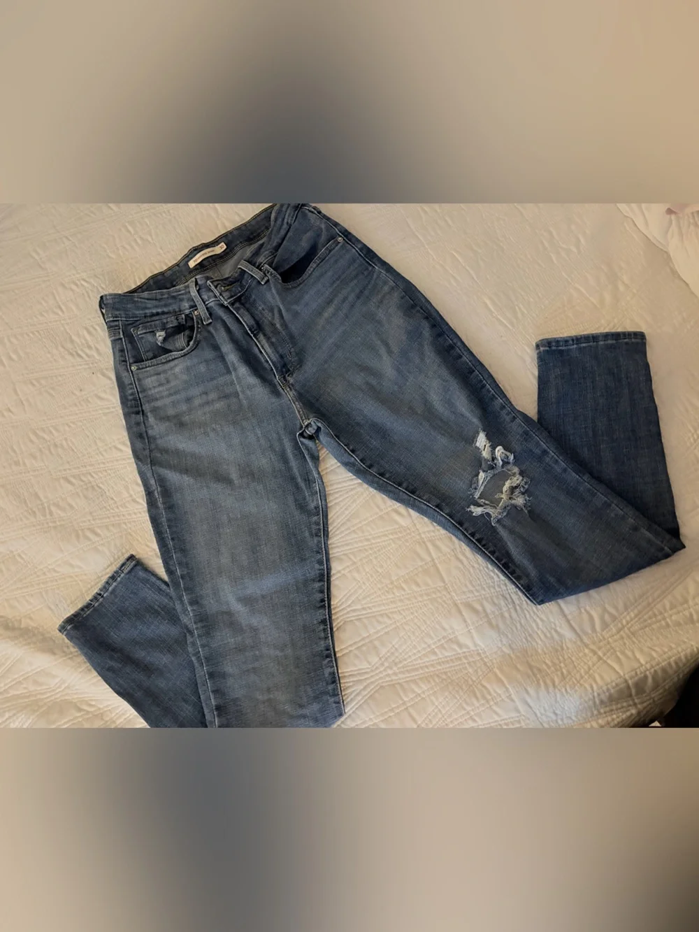 Levi's Women's Blue Straight-Leg Jeans with Knee Distress